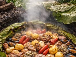 Breve historia del curanto chileno Historia del curanto chileno - imagen de curanto generada por IA