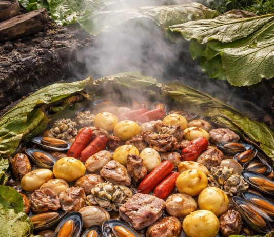 Historia del curanto chileno - imagen de curanto generada por IA